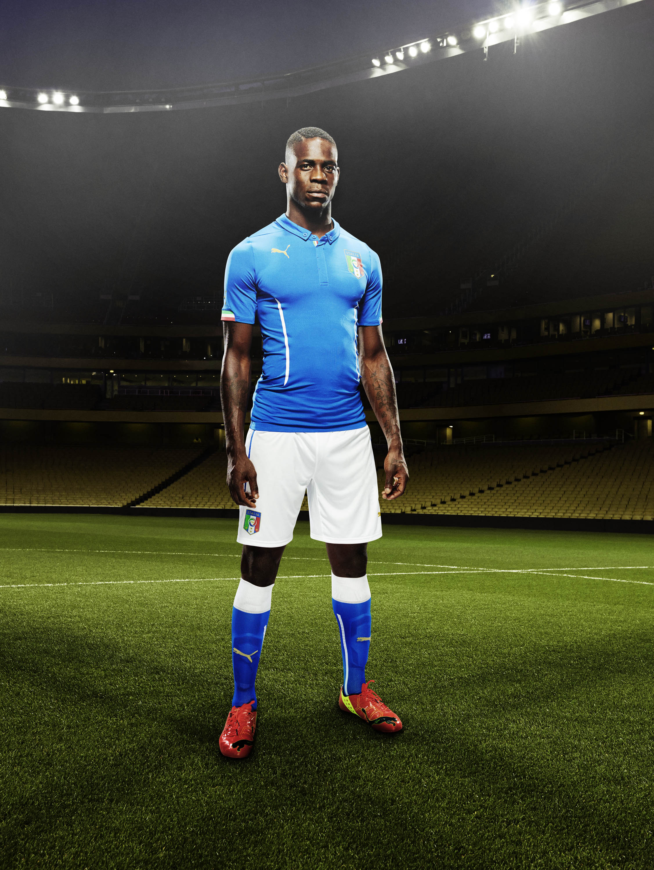 Mario Balotelli in the 2014 Italy Home Kit that features PUMA's PWR ACTV Technology