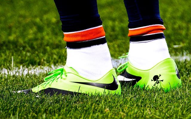 Crampons verts portés par Brandon Marshall le 10 octobre 2013